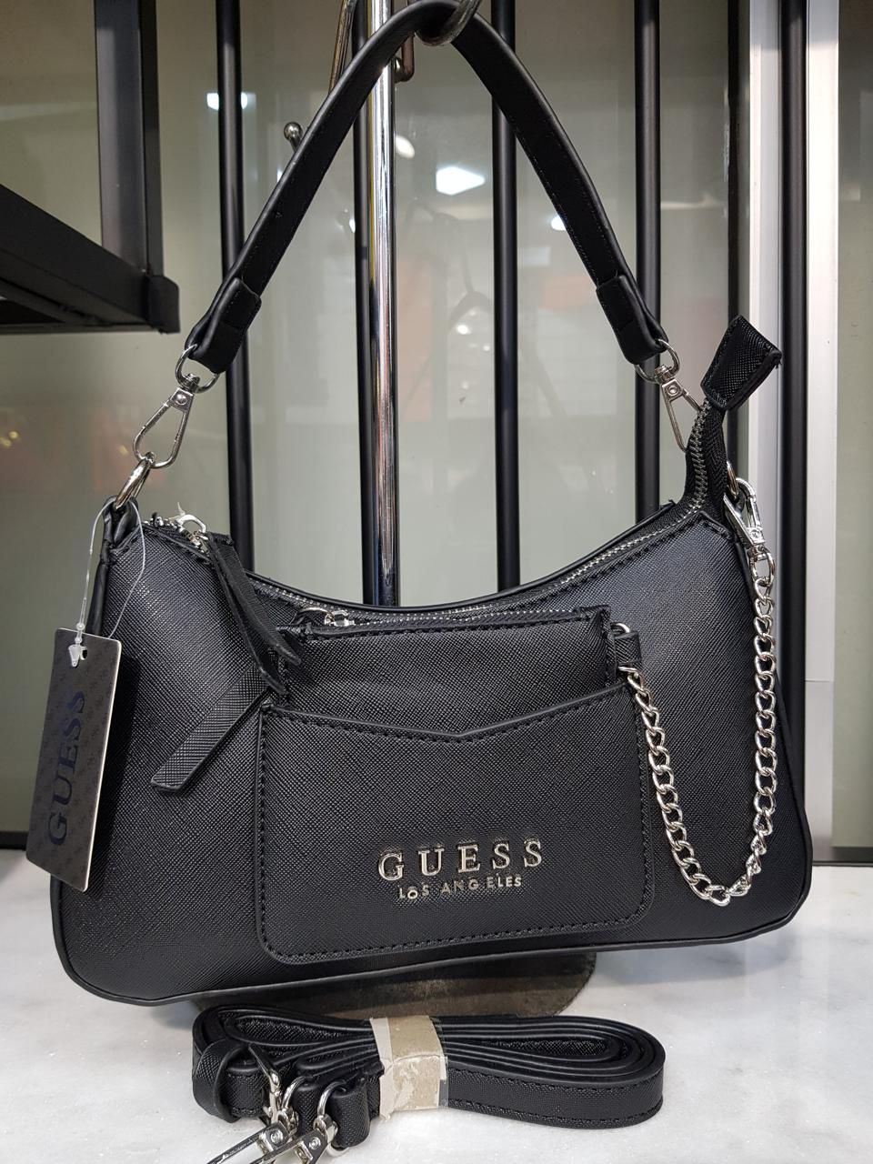حقائب يد من تصميم غيس (Guess Dimension Hand Bags)