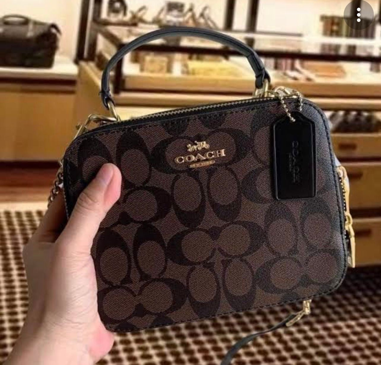 حقيبة يد كروسبودي بتوقيع كوتش