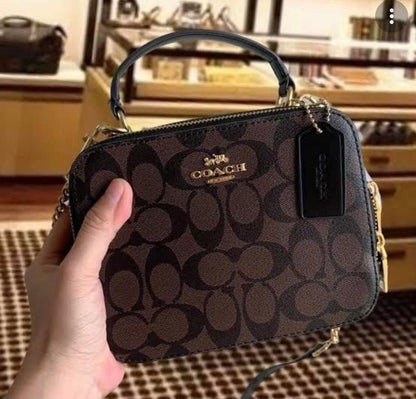 حقيبة يد كروسبودي بتوقيع كوتش