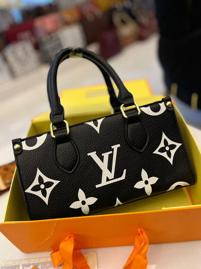 حقيبة LV On the Go Statement Bag متوسطة الحجم